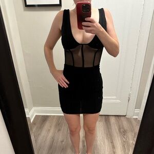 Black corset mini dress from Tiger Mist